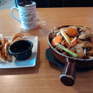 H6. Rice Clay Pot House Special A2. Fried Dumplings Jasmine Tea