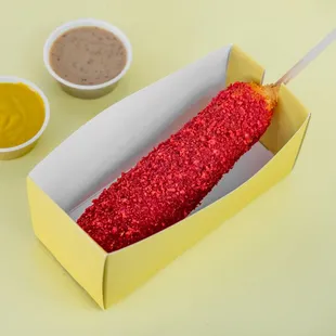 a hot dog in a paper box