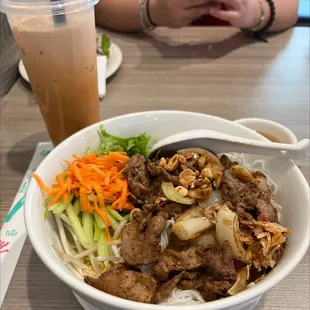 a bowl of beef and noodles