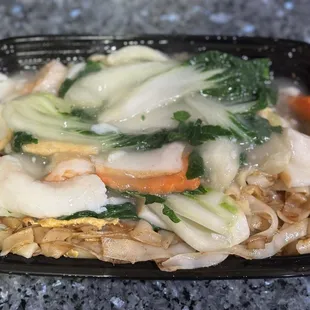 Seafood Chow Fun. Make sure to specify you'd like yours dry if that is your preference. This dish naturally comes wet with gravy here.