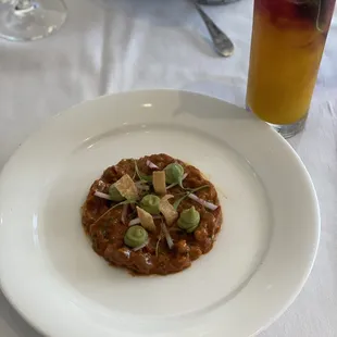 Yellow Fin Tuna Tartare* w/ the Sunset cocktail