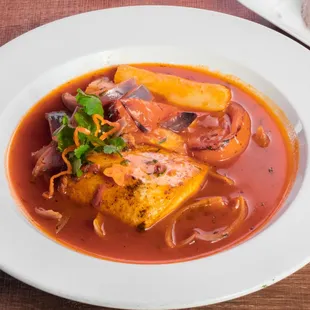Sudado de Pescado- Fish stew with tomato, onion, squash, yuca, and side of white rice.