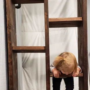 The girls loved the inside too. This is the ladder up to the loft