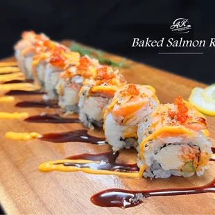 Spicy crab, cream cheese, cucumber, topped with baked salmon crunch, eel sauce, spicy mayo and tobiko