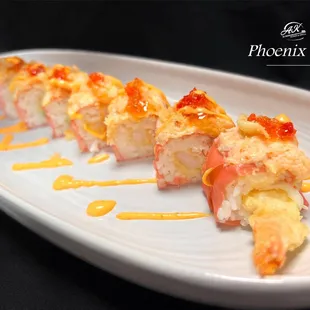 Soy paper, crab salad, cucumber, shrimp tempura, topped with lobster salad, tempura crunch, tobiko, AK sauce