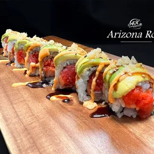 Spicy salmon, spicy yellowtail, spicy tuna, tempura crunch, topped with avocado, eel sauce and spicy mayo.