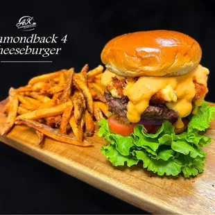 1/2 lb Angus Beef, fried cheese blend (pepper jack, cheddar jack, swiss habanero, cream cheese), lettuce, tomato, red onions, side of fries