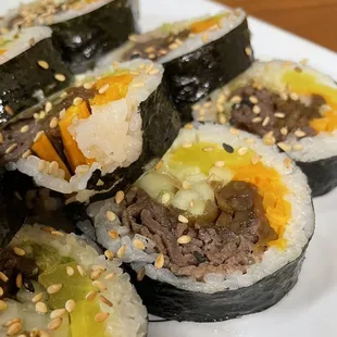 a close up of a plate of sushi