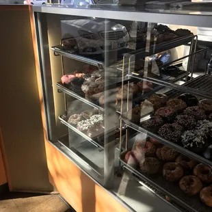 a display case full of donuts