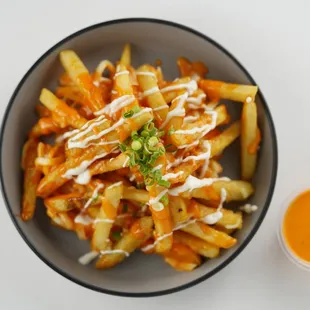 a bowl of kimchi fries