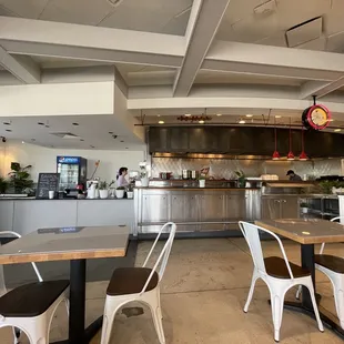 the kitchen and dining area of a restaurant