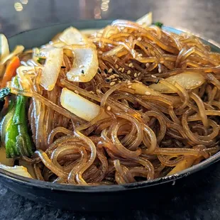 I love japchae, stir-fried glass noodles with veggies.
