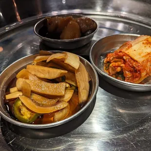 The bulgogi bowl was served with potatoes, kimchi, and pickled veggies.