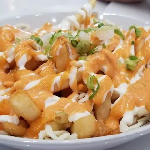 a bowl of kimchi fries