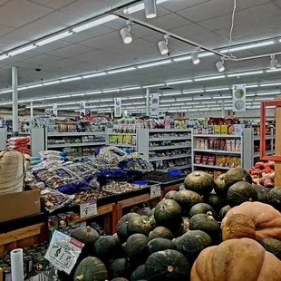 a grocery store with a variety of fruits and vegetables