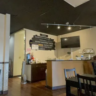 a man sitting at a table in a restaurant