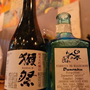 two bottles of sake on a table