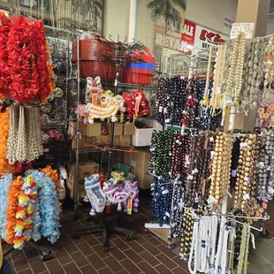 Leis and puppet dragons