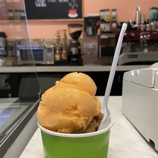Mango scoop on top, coffee scoop on bottom