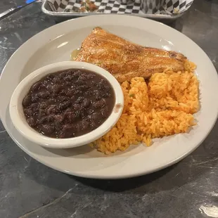 Salmon plate with rice and black beans