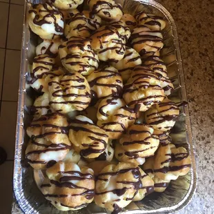 cream puff cream custard with chocolate drizzle