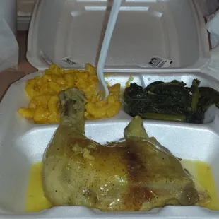Bake chicken smoother in gravy with mac and cheesyy and big leafyy greens