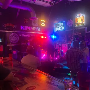 a band playing at a bar