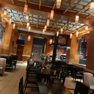 a restaurant with tables and chairs