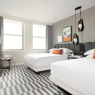 Double Queen rooms are spacious and perfect for family travel.