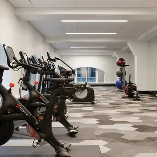 Onsite fitness facility with top of the line equipment like Peloton bikes.