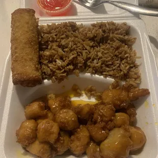 Orange chicken rice bowl with fried rice and egg roll