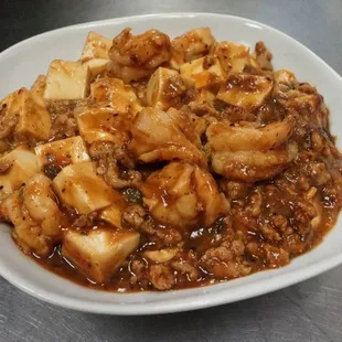 a white bowl of food