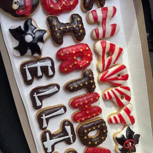 a box of decorated donuts
