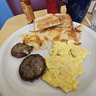One egg, rye toast, 2 sausage patties $5.49. Coffee $1.99