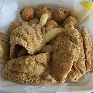 Red Snapper Lunch: no bread + Fries + hush puppies + fresh slice lemon on the side (FOOD IS AMAZING)