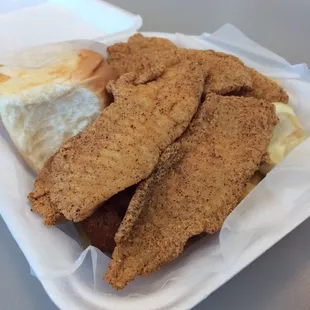 Tilapia, fries, and a roll- bland fried bland fish