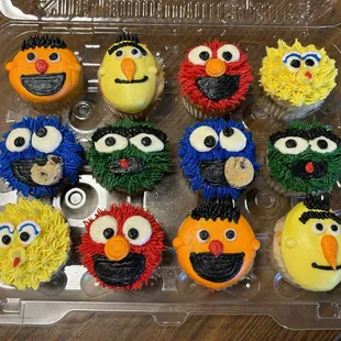 Big Bird, Elmo, Oscar, Bert, Ernie, and Cookie Monster funfetti cupcakes! So cute and delicious!