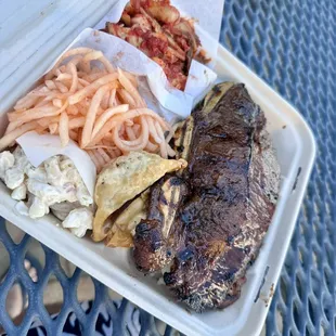 ows a tray of food on a table