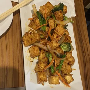 Tofu and veges.  So much tofu, well seasoned.