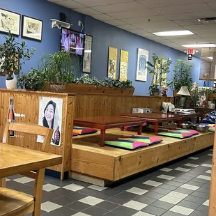 Inside area. Variety of seating options including booths and tables. Very clean.