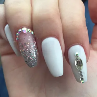 all of these nails have different nail shapes, lopsided and uneven. i paid $65 for these. the polish is thinner in some places.