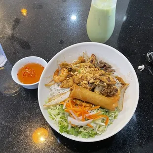 Typical noodle dish with specialty drink.