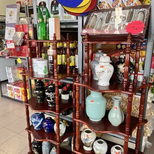 a display of oriental vases