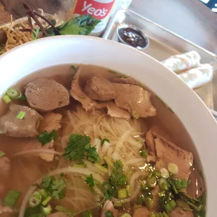 Large brisket &amp; meatballs pho and shrimp spring rolls.