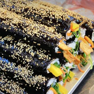 a stack of sushi rolls