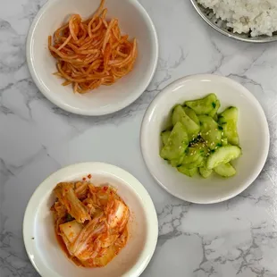 Radish, Cucumber, Kimchi, and Rice (side dishes)