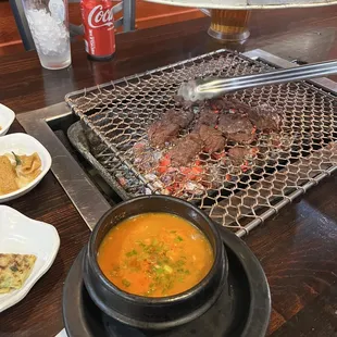 Charcoal BBQ with hanger steak and doenjang-jjigae (soybean paste stew)