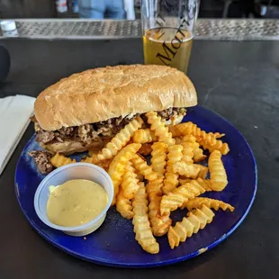 Cheesy Beef sandwich, with crinkle cut fries. They provided me mustard because I prefer it to Mayo.