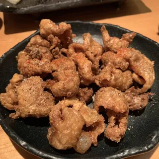 Crispy chicken skin salad