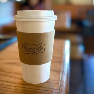 a coffee cup on a table